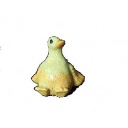 petit-canard-assis-autocollant-jaune-avec-ailes-jaunes