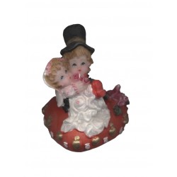 figurine-mariage-couple-de-maries-sur-un-coussin-coeur-rouge